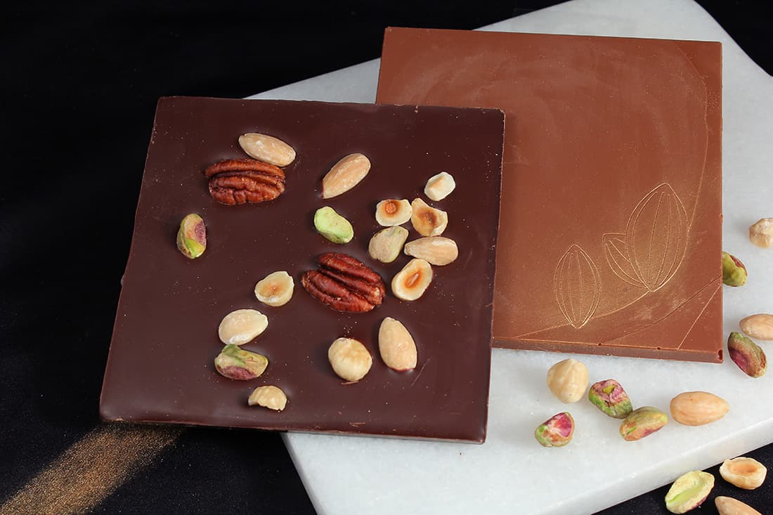 Tablette chocolat noix mélangées | Gourmandises chocolatées | Pâtisserie Chocolaterie Raffin